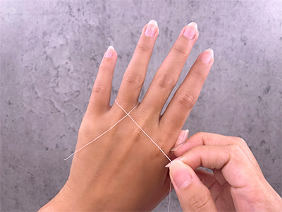 Step 1 Grab a piece of string and wrap it around